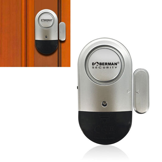 Oval door and window magnetic spring alarm sensor with silver top and black base
