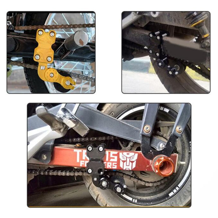 Gold aluminum chain adjuster installed on motorcycle swingarm, black roller and mounting bolts