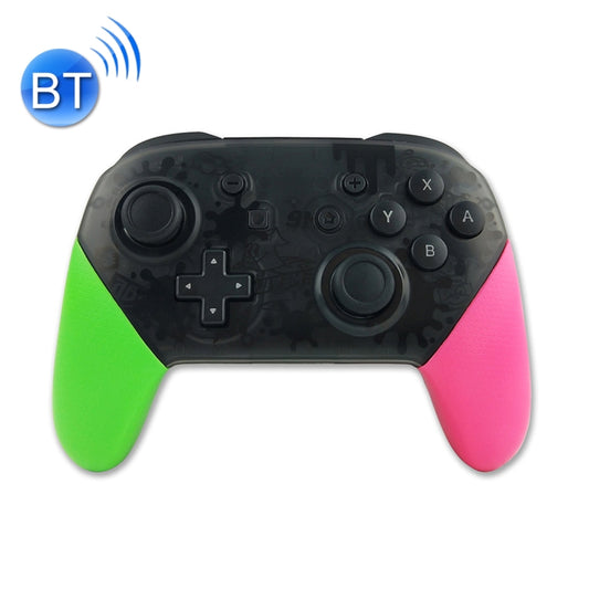 Wireless game controller with black face, green and pink grips, front buttons