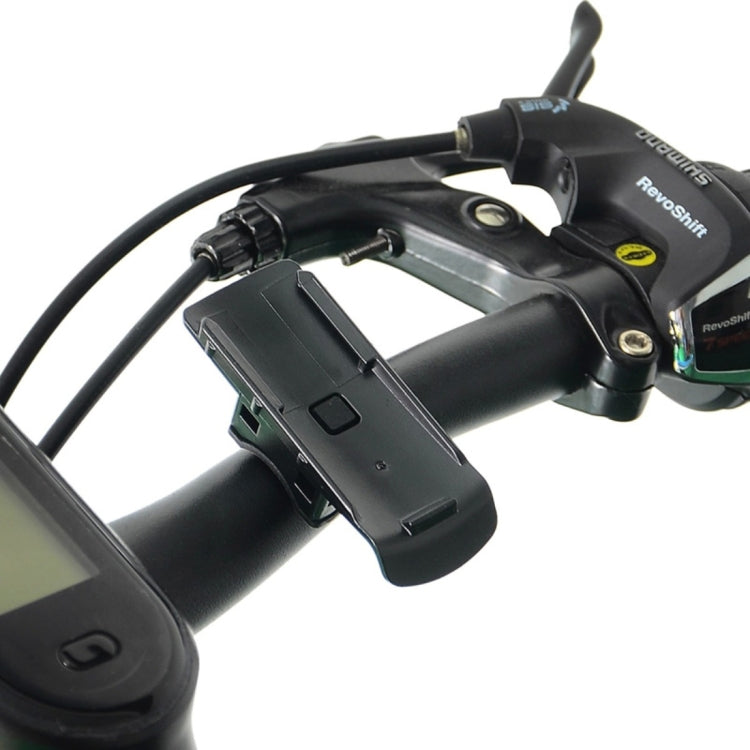 Bike-mounted black GPS holder attached to handlebar with cradle facing upward.