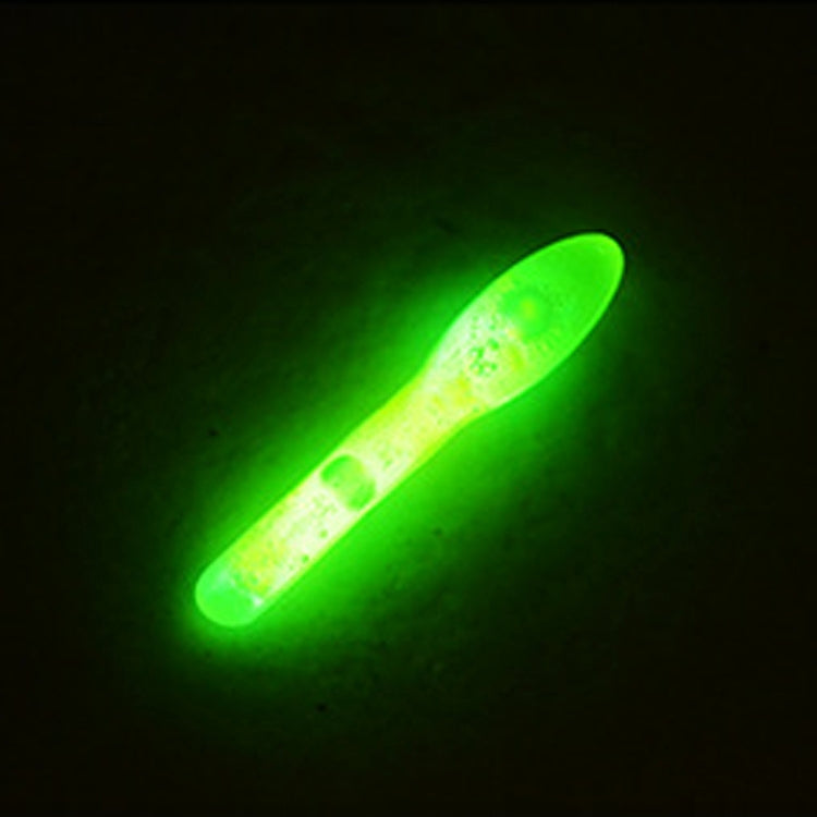 Single bulb-shaped luminous fishing light stick glowing bright green