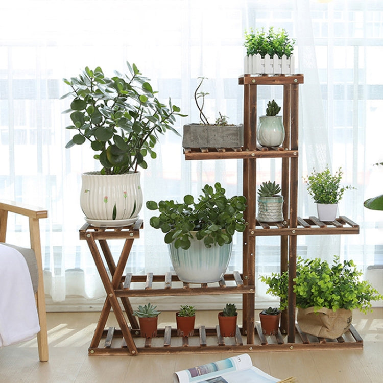 Wooden plant flower display stand with tiered shelves and potted plants, front view