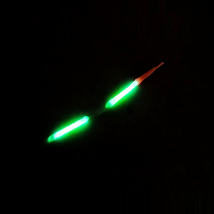 Glowing night fishing light sticks, green light tips with orange ends in dark