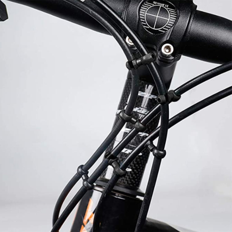 S-style brake cable clips on front bicycle cable runs near the stem