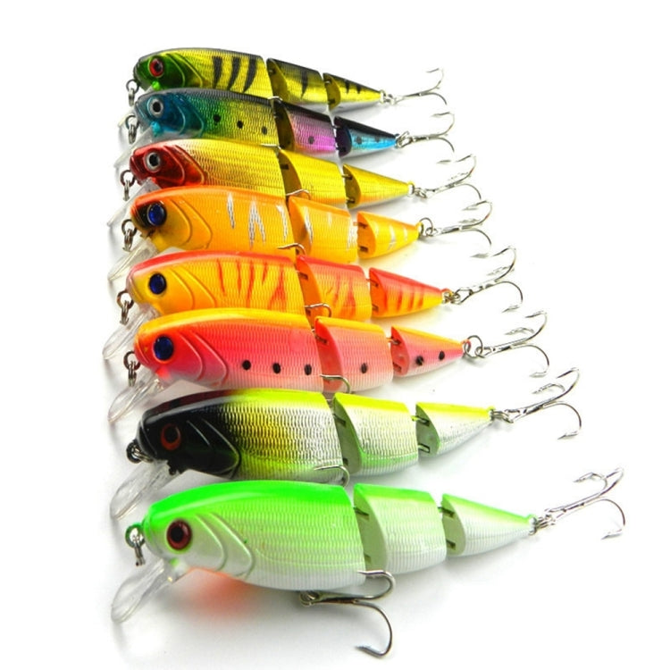 Assorted hard plastic fishing lures with treble hooks, multicolor bodies, clear tails