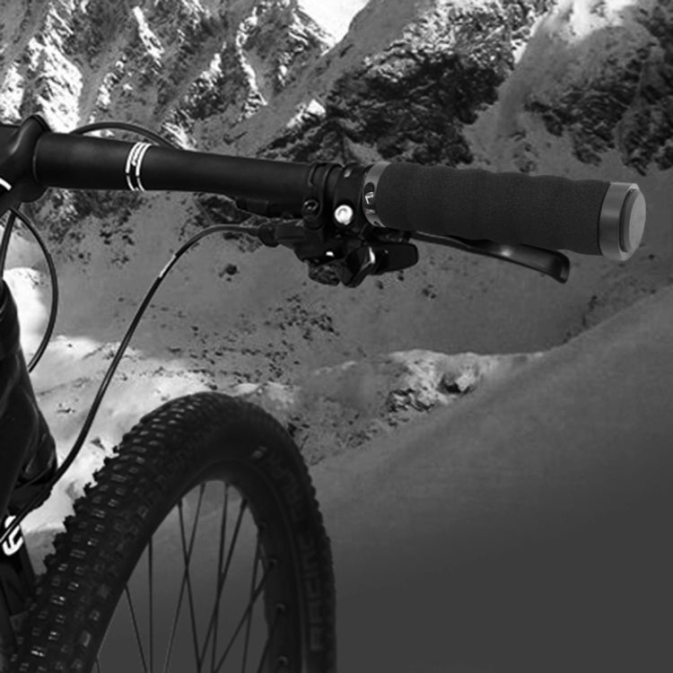 Black foam bike handlebar grips installed on an MTB handlebar