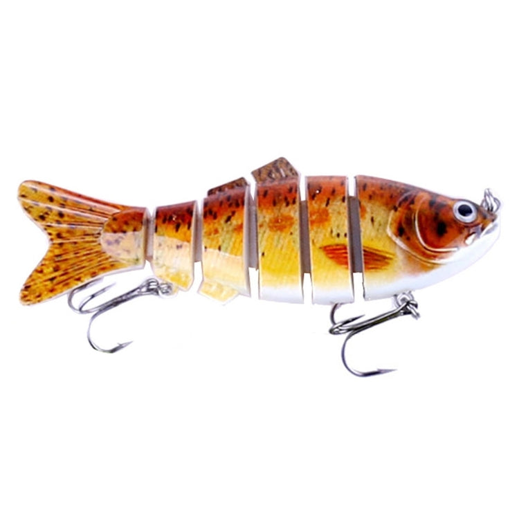 Multi-section hard plastic fishing lure with orange-brown body, yellow tail, and treble hooks