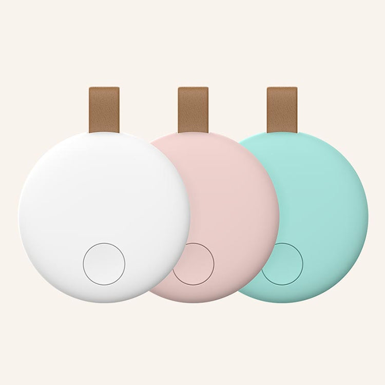 Set of three round Bluetooth anti-lost trackers in white, pink, and mint green