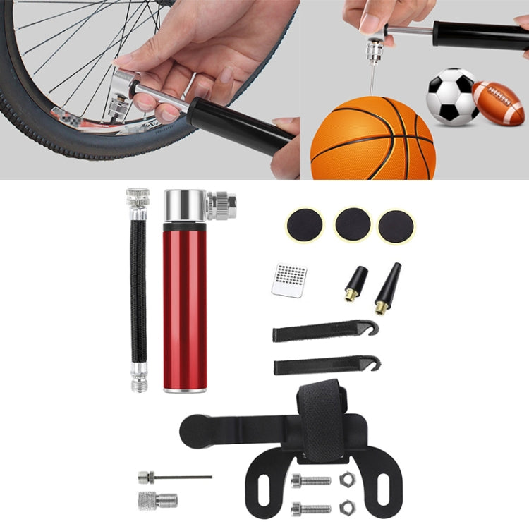 Portable pump kit with red mini pump and included patches, levers, tools