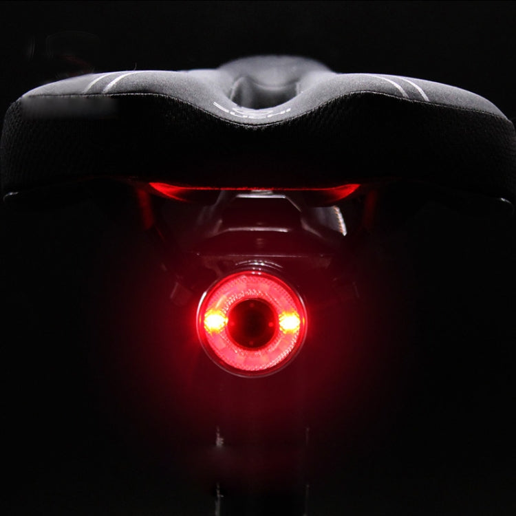 Mounted bicycle taillight with bright red LED glow from black housing