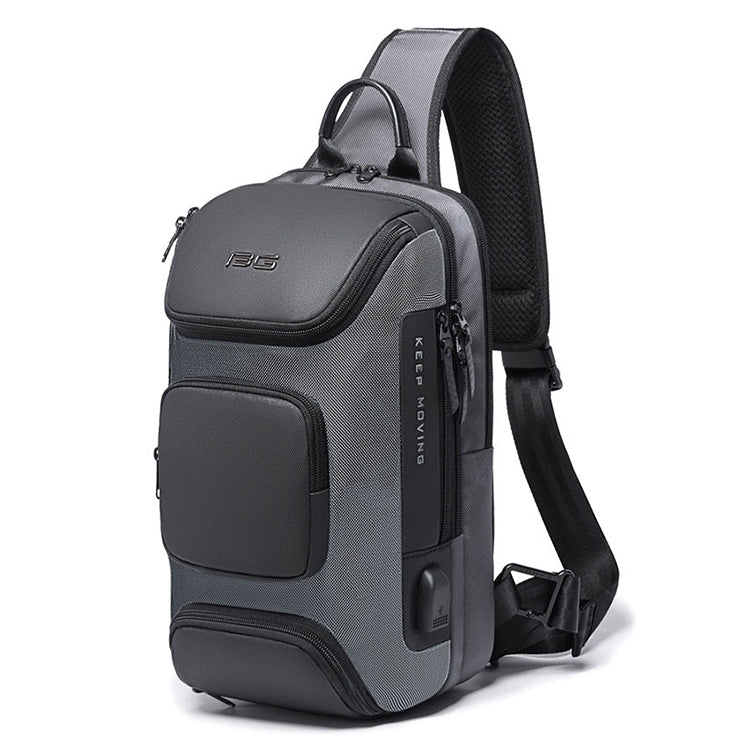 Black chest bag with top handle, front organizer pockets, and side zips
