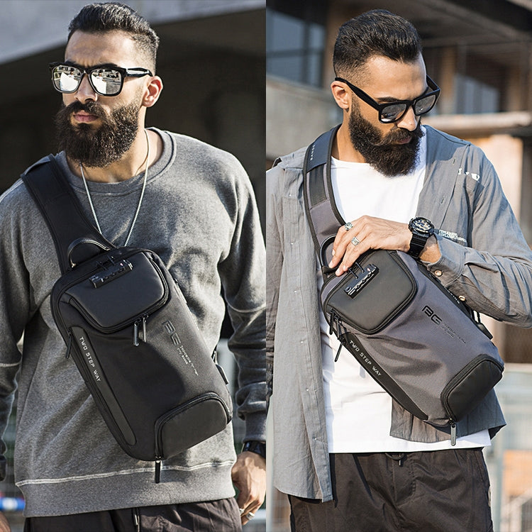 Men's crossbody chest bag with multiple zip compartments, worn with adjustable strap