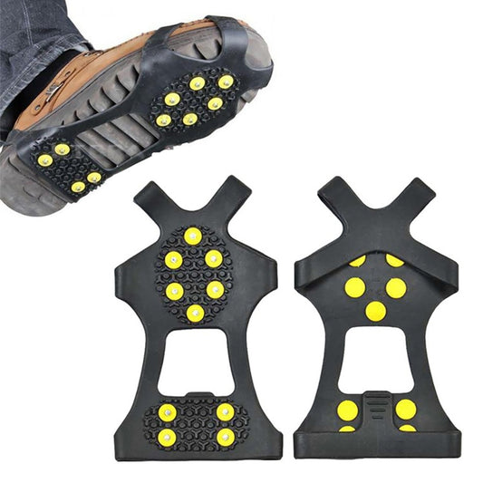 Black ice cleat shoe covers with yellow traction nubs, cross-studded sole pattern