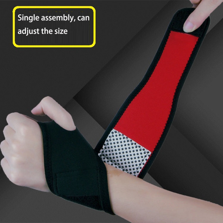 Self-heating compression wristband on arm, black strap with red inner heating panel