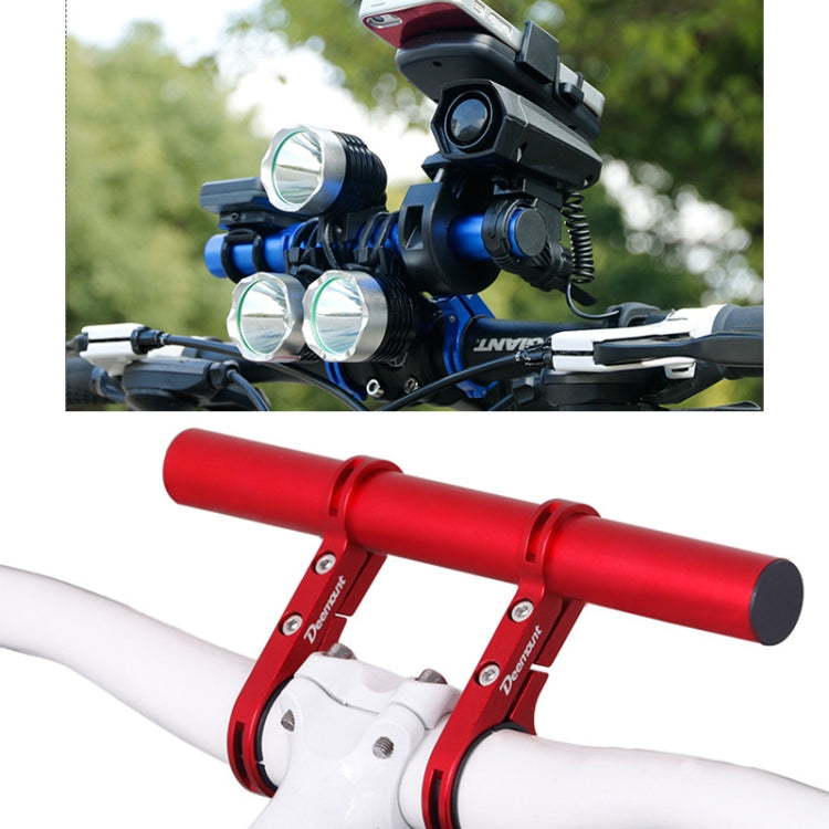 Red handlebar extension bracket mounted on bicycle with flashlight holder