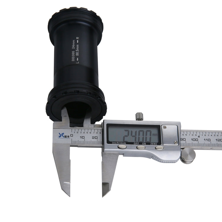 Black BB386 EVO press-fit bottom bracket measured with digital calipers