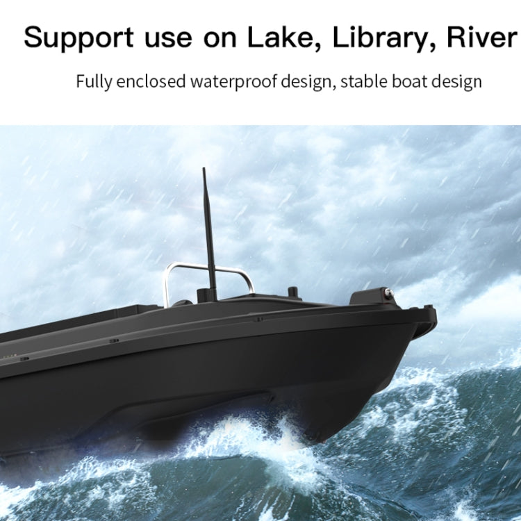 RC bait fishing boat moving on water with raised antenna.