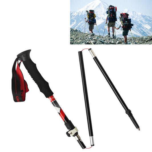 Black folding trekking pole with red accents and adjustable strap handle