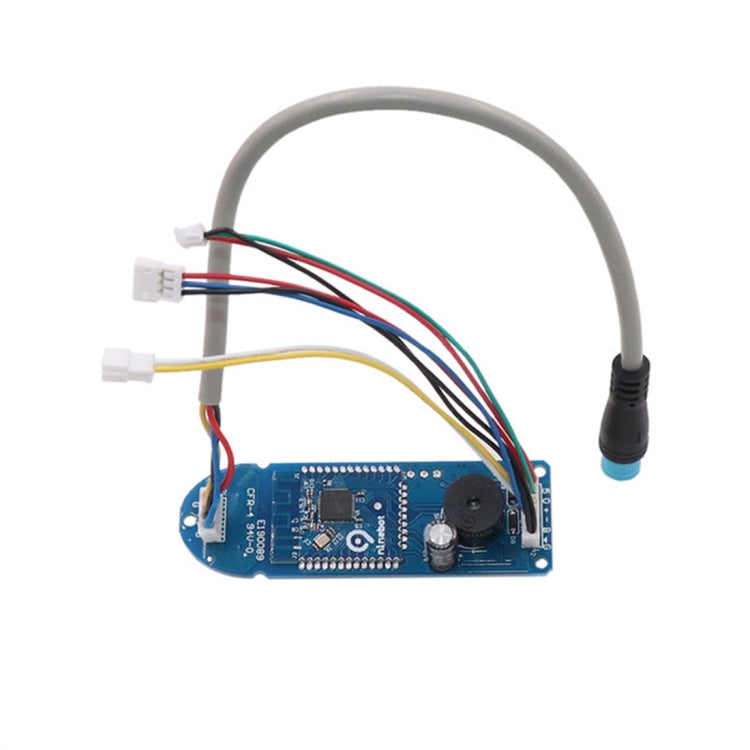 Electric scooter dashboard PCB with multi-color wiring, capacitors, and cable leads
