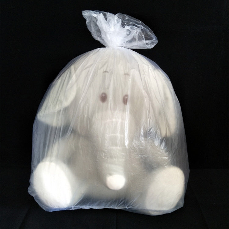 Tied clear PE plastic bag holding soft items, gathered top closure visible