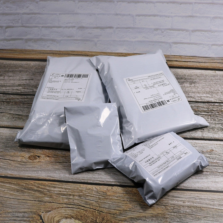 Set of waterproof plastic shipping bags, silver grey pouches with printed labels
