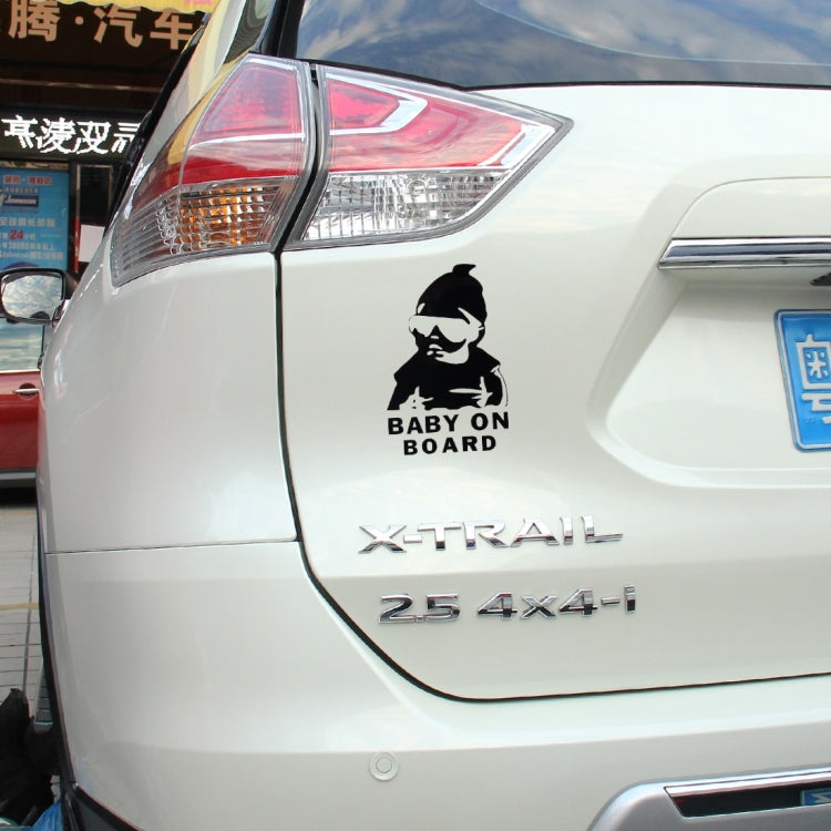 Black vinyl car sticker with baby silhouette and “BABY ON BOARD” on car tailgate
