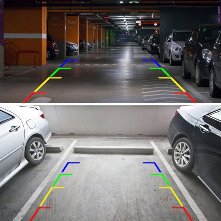 Car rear view camera screen view with colored parking guide lines and lane markers