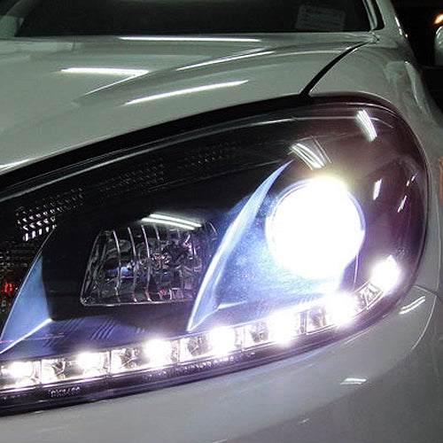 Car headlight with bright white H7 beam turned on
