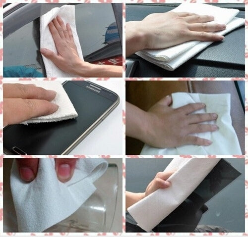 Microfiber cleaning cloth wiping car and phone surfaces