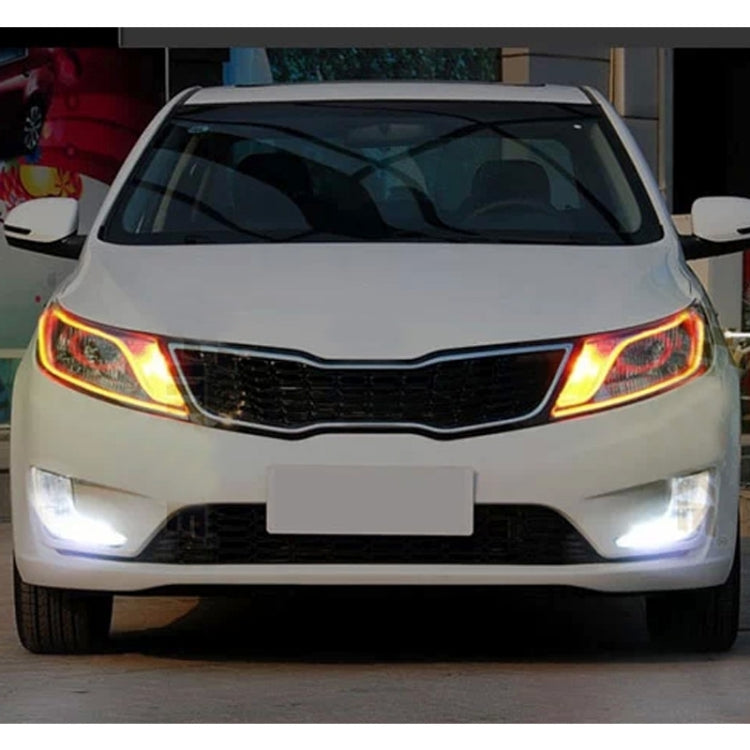 Front of vehicle with bright white and amber daytime running lights