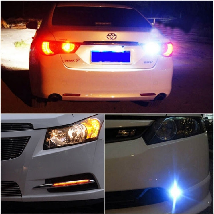 Car rear with red tail lights plus blue LED lamp illumination