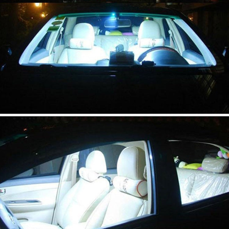 Car interior illuminated by bright white LED lighting from the installed bulbs