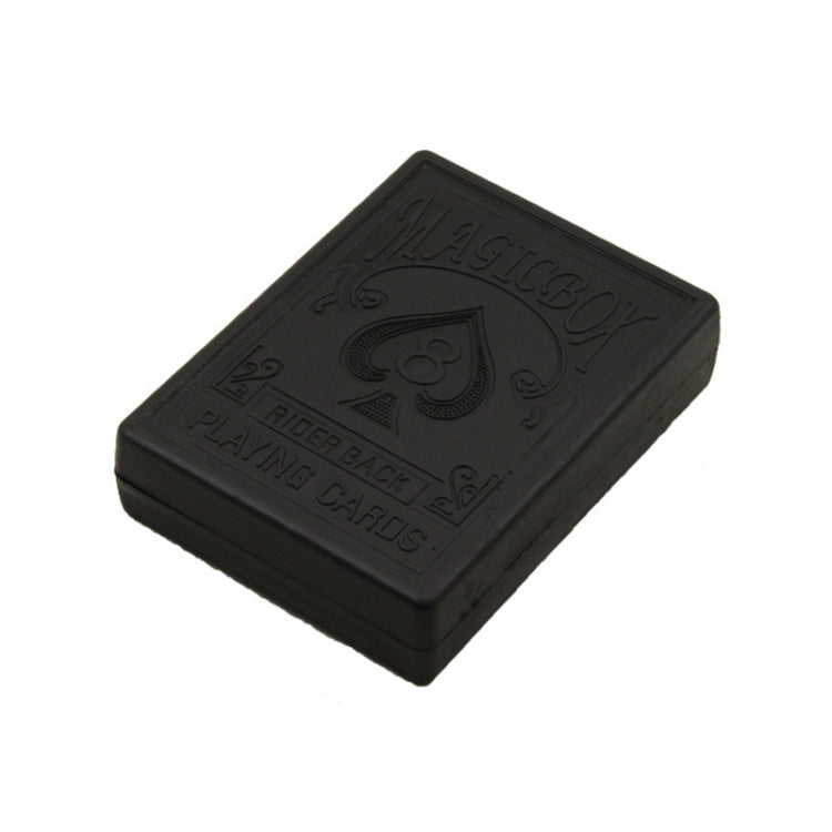 Black embossed magic card box lid with spade emblem and “PLAYING CARDS” label