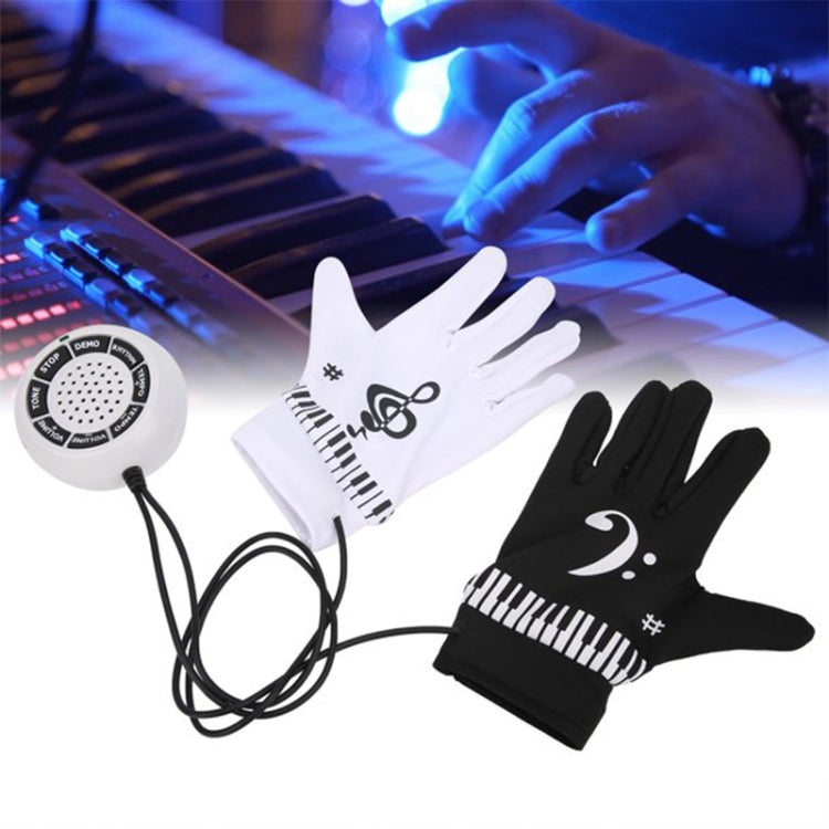 Electronic piano gloves with white and black keyboard graphics and connected speaker controller