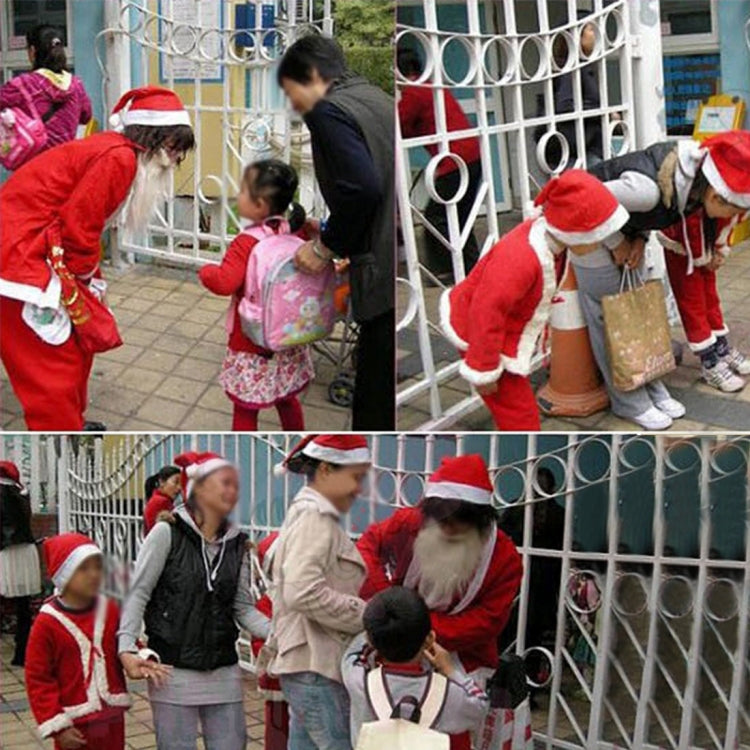 Santa hats worn by people outdoors, red caps with white trim and pom.