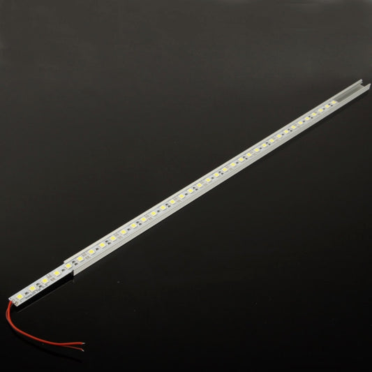 Warm white LED strip light, slim silver bar with red wire end and visible LED row