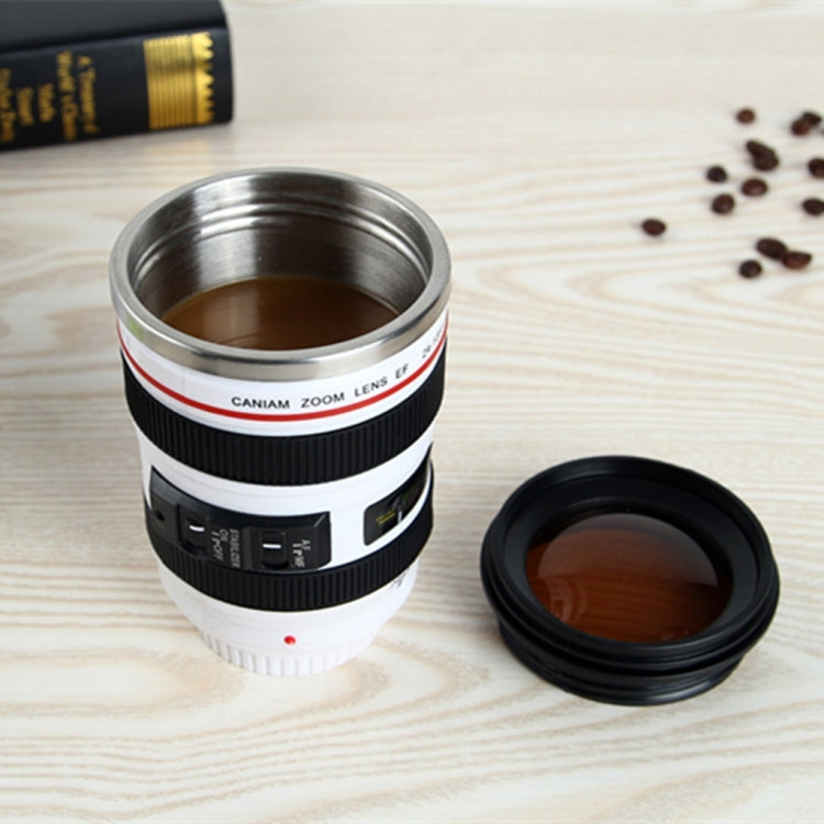 White and black camera lens cup mug with open top and separate black lid