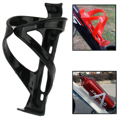 Black plastic bike bottle cage holder with open bottle cradle.
