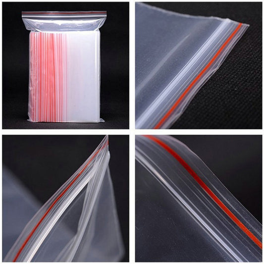 Clear plastic self-adhesive seal pouch with red sealed edge, 4x6 cm