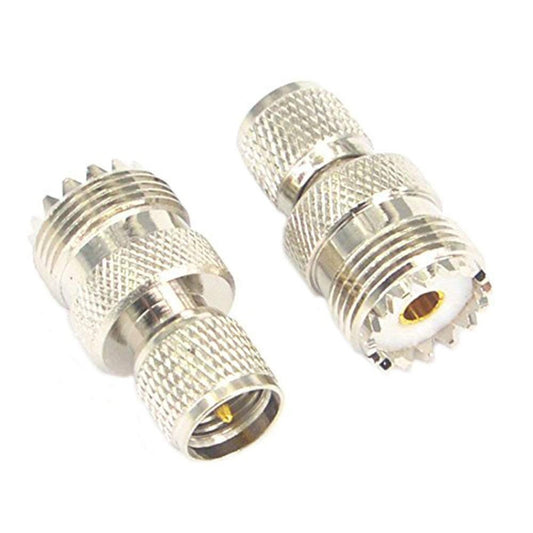 Silver RF coax adapter, UHF male and UHF female connectors side view with gold pin