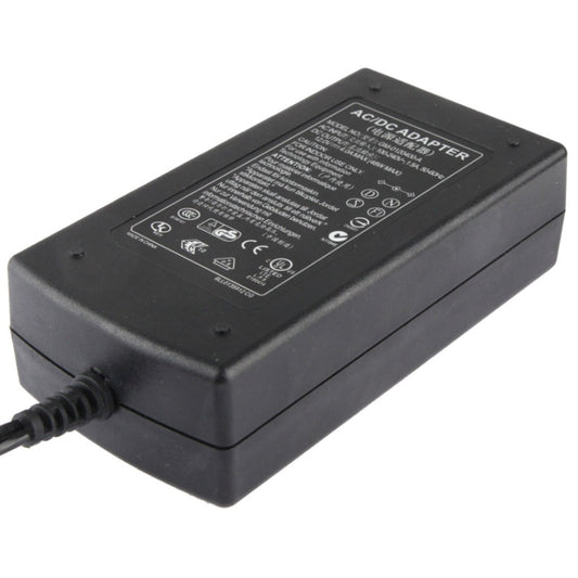 Black AC/DC adapter power supply with label on top and attached DC cable end