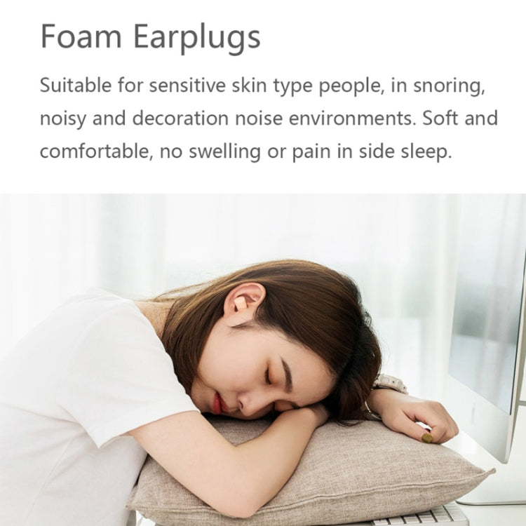Pink foam earplug in a sleeper’s ear for quiet, comfortable rest