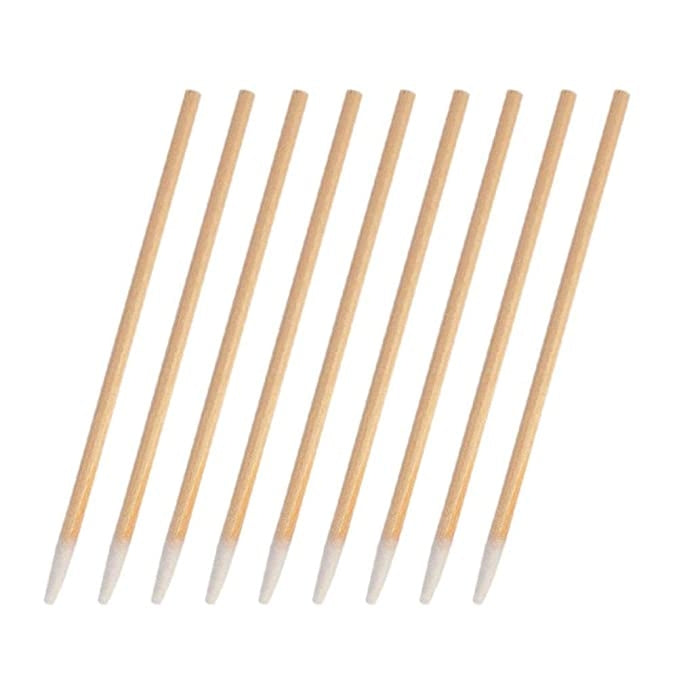 Cotton swabs, set of single white cotton tips on light wooden sticks