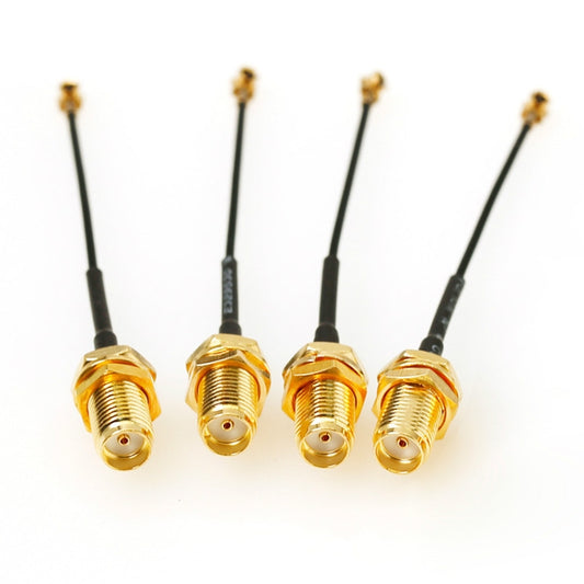 Five SMA female connector ends with black leads on braided RF adapter cables