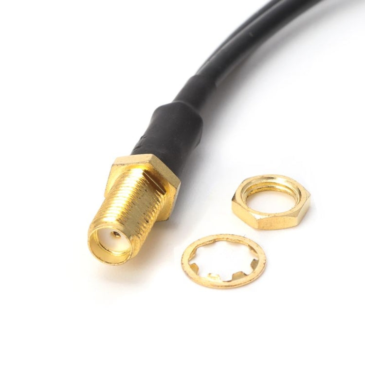 TS9 male coax connector with gold threads on black RG174 cable, plus nut and gasket