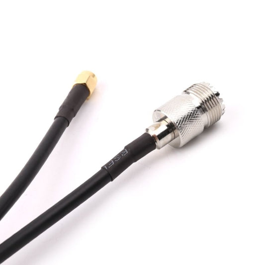 RG58 coaxial cable end view: UHF female plug and SMA male plug on black cable