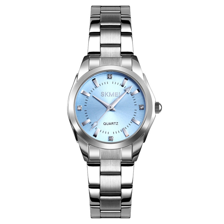 Silver-tone wristwatch with light blue dial, rhinestone markers, and metal bracelet