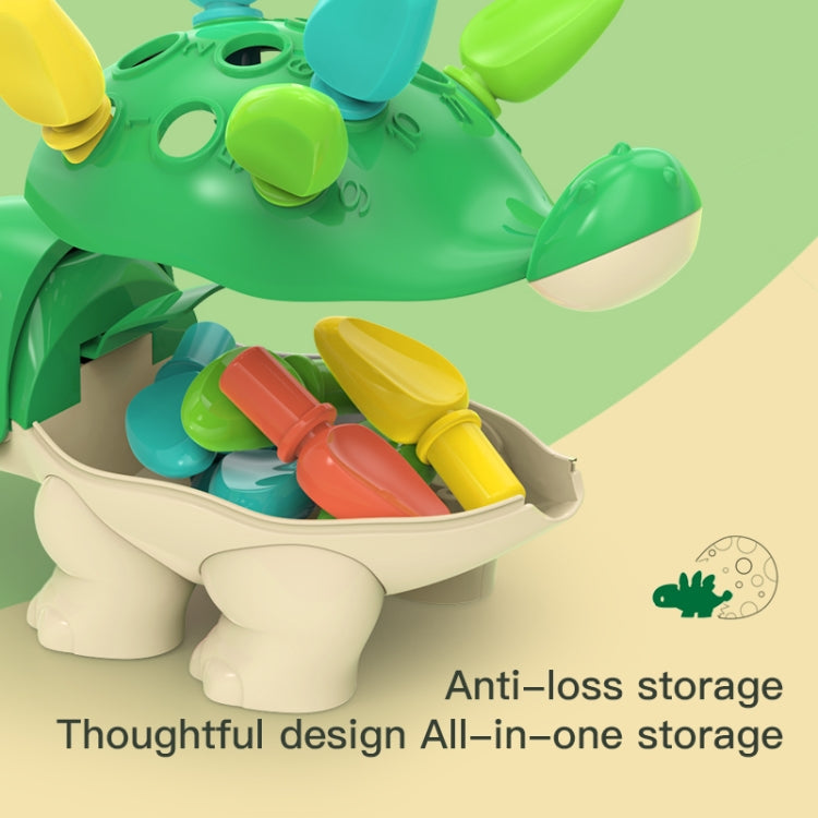 Close view green dinosaur body with storage holds colorful insert pieces, anti-loss design