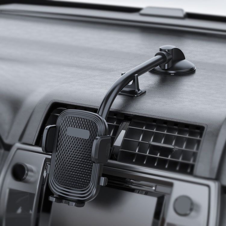 Dashboard car phone holder mounted near air vent, black with textured grip pad