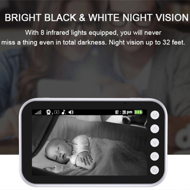 Handheld baby monitor screen showing black-and-white night vision of sleeping baby